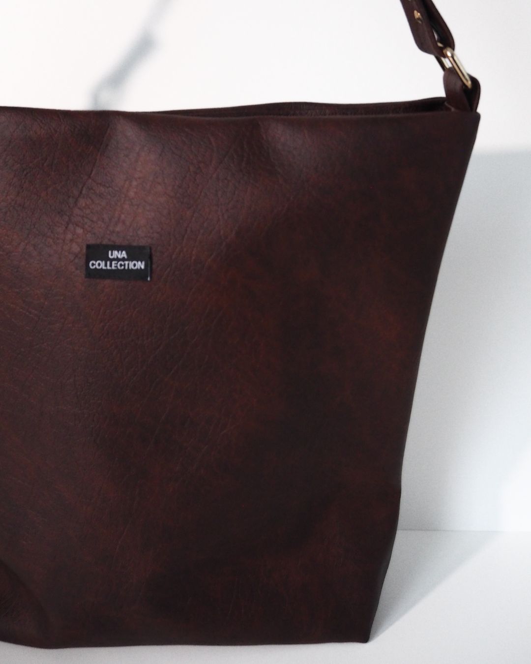 ALMA-laukku, loimuava ruskea