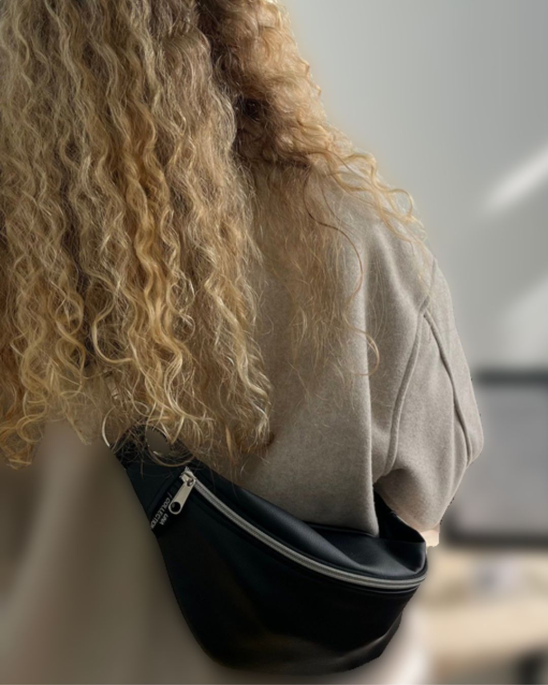 EMILIA-vyölaukku, ylijäämä keinonahka, musta hopea